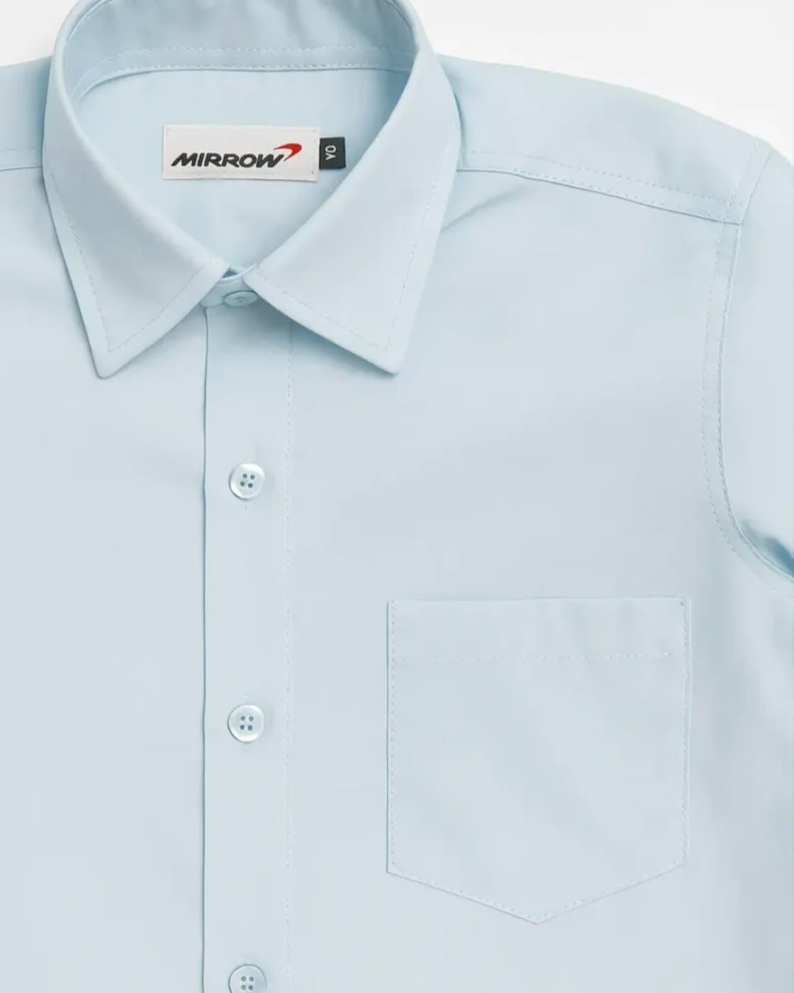 Camisa colegial celeste — detalle